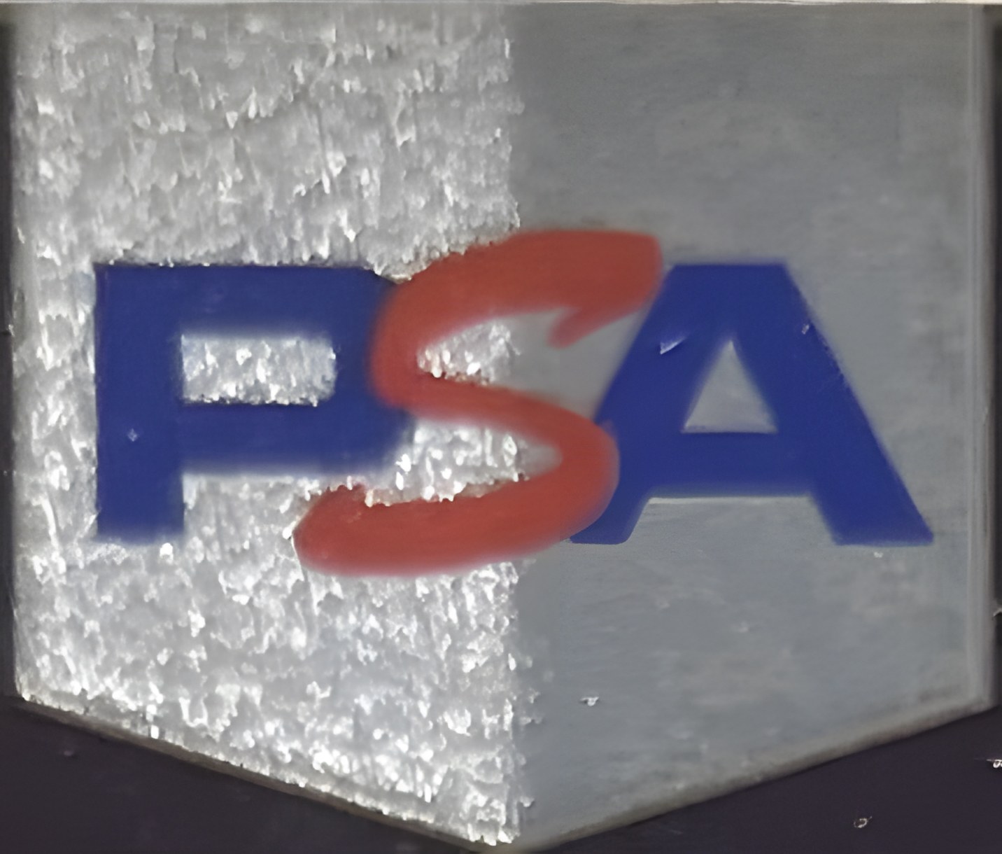 Back label at an angle, showing the illumination gradient across the holographic panels